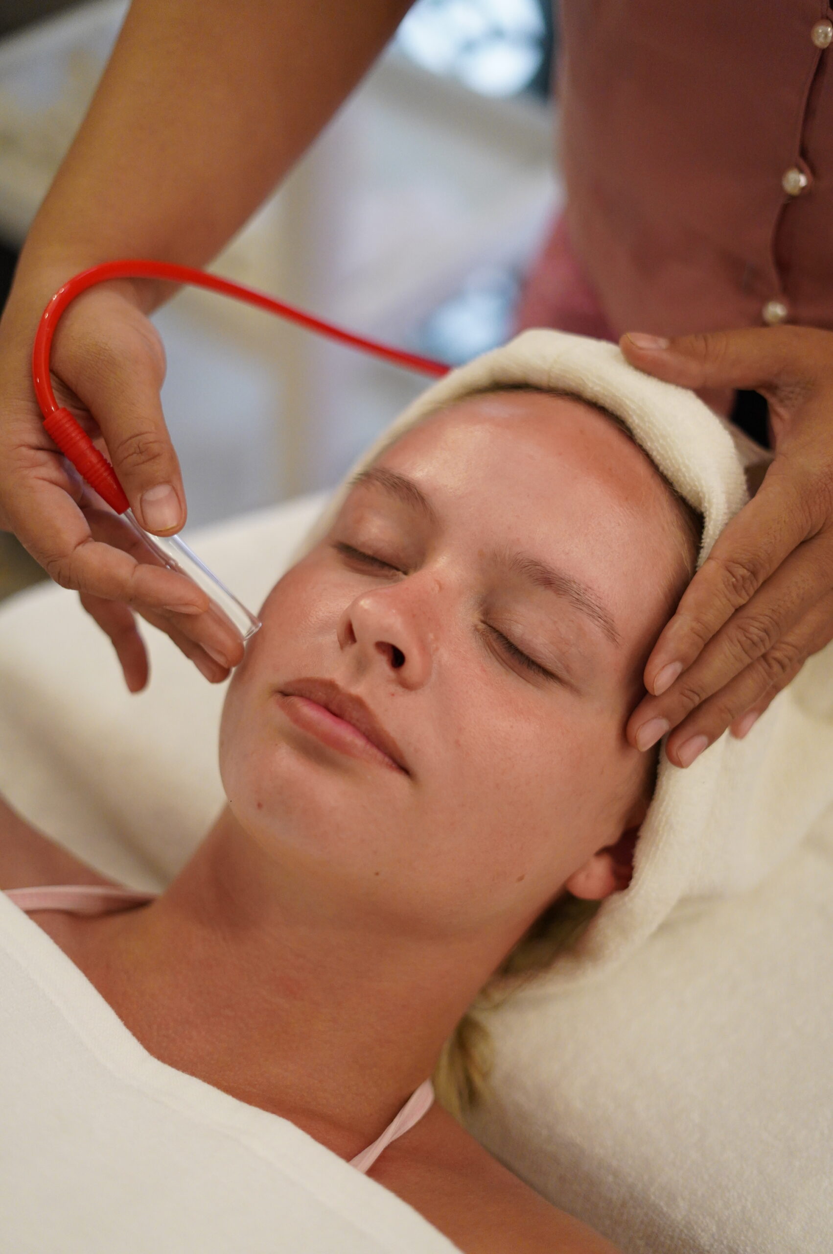 Signature Japanese-style head spa ritual with waterfall halo rinse at Dusita Spa, Koh Samui